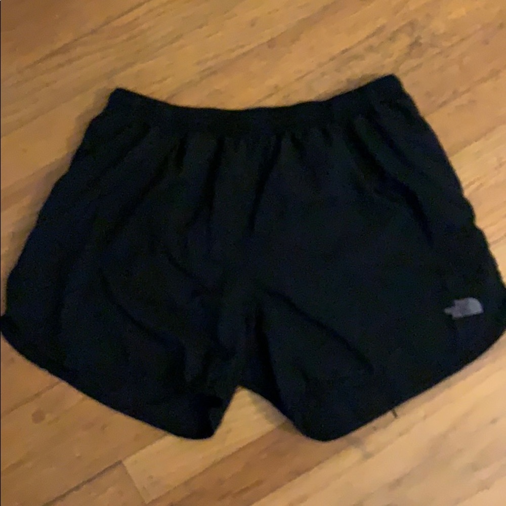 Black Northface shorts.